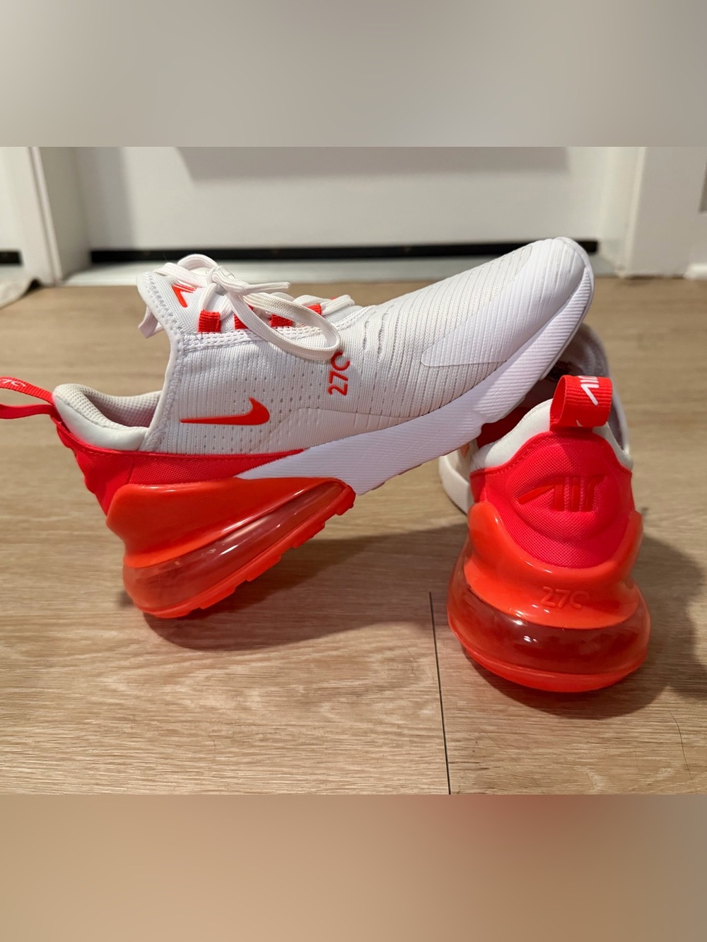 Nike White Sneakers with Red-Orange Accents
